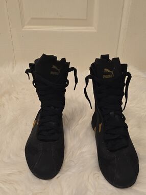 Puma Women’s Black Light High-Tops with Gold Logo